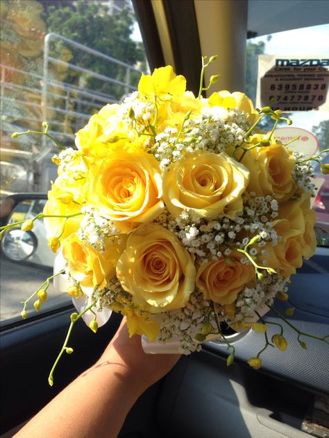 Yellow roses, baby's breath & dancing lady orchid bridal bouquet  For orders & enquiries please email to p01989@yahoo.com.sg or visit our FB myreika13 Yellow Rose Flower Bouquet, Yellow Prom Bouquet Ideas, Yellow Prom Flowers Bouquet, Yellow Roses Wedding Bouquet, Yellow Rose Bridal Bouquet, Yellow Prom Flowers, Bouquet Of Flowers Yellow, Yellow Bouquet Wedding, Yellow Corsage