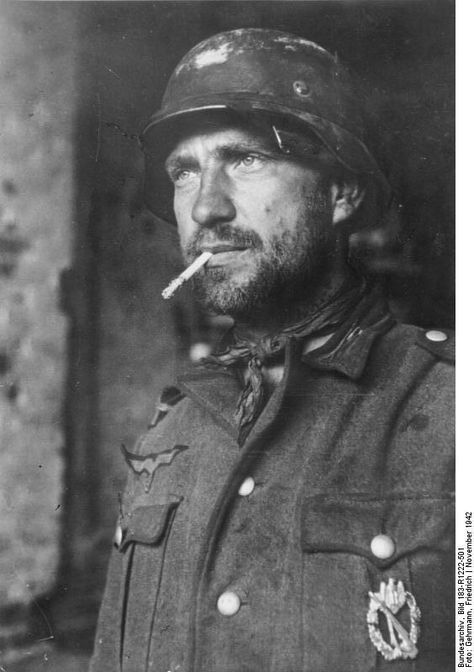 Battle of Stalingrad: German soldier with cigarette. Perang Dunia Ii, Battle Of Stalingrad, German Soldier, Rare Historical Photos, Shell Shock, German Soldiers Ww2, Wwii Photos, German Uniforms, German Army