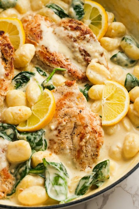 Lemon Chicken Gnocchi is a 1-skillet meal that’s ready in under 30 minutes. It’s creamy, meaty, and loaded with bright lemon flavor! Lemon Chicken Gnocchi, Chicken Gnocchi, Creamed Potatoes, Big Board, Lemon Flavor, Hearty Dinner, Chicken Main Dishes, Spinach And Cheese, Lemon Chicken