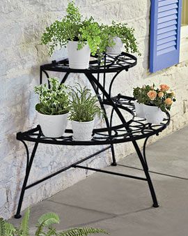 Plant stand-one like this around a tree in wood would be great for spinach, etc. how to do that? Garden Diy Furniture, Wrought Iron Decor, Modern Plant Stand, Plant Stands Outdoor, Creative Organization, Metal Plant Stand, Iron Plant, Diy Garden Furniture, Plant Stand Indoor