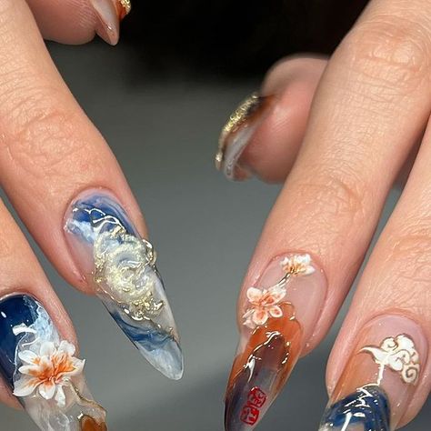 APRÉS GEL X NAILS + MAKEUP 🇨🇦 on Instagram: "Year of the dragon 🐉 国画(national painting) and tea ceramics inspired nails   #apresgelx #handpaintednailart #gelxnails #gelnailsdesign #longnails #nailart #3Dnails #dragonnails #nails2inspire #watercolornails #chinesenails #texturednails #chromenailart #artisticnails #gelnailart #pinterestnails #nailartist #nailsofinstagram #almondnails #paintingnails #floralnails" China Print Nails, China Inspired Nails, Ceramic Nail Art, Impressionist Nails, Chinese Inspired Nails, Year Of The Dragon Nails, Atla Nails, China Nails Design, Chinese Dragon Nails Designs