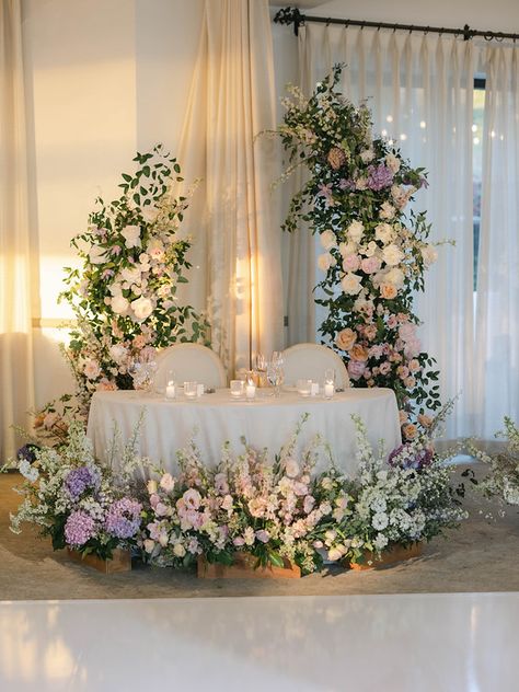 This photo hosted by SmugMug; your photos look better here. Flower Reception Decoration, Flower Sweetheart Table Wedding, Bridal Table Arrangement, Flower Poles Wedding, Sweetheart Table Wedding Floral, Wedding Decoration Inspiration, Sweetheart Table With Backdrop, Romantic Themed Wedding, Stage Flowers Wedding