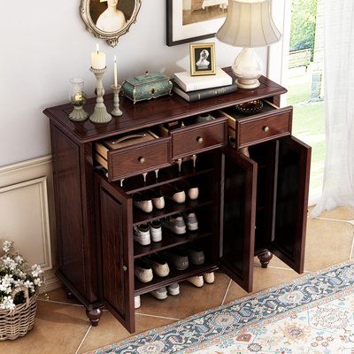 Introducing our premium American-style wall-mounted entryway shoe cabinet, a captivating blend of elegance and practicality. This show-stopping piece exudes warmth and comfort, perfect for any home. Dainty Table Finish: Nut Brown | Dainty Table TB698532060375DT&Colour&Size 19 Pair Solid Wood Shoe Storage Cabinet Brown 41.34 x 47.24 x 14.96 in | Organization | DBNT1115 | Wayfair Canada Show Cabinet Entryway, Entryway Shoe Cabinet, Shoe Cabinet Entryway, Wood Shoe Storage, Wood Shoe, Entryway Shoe, Wood Shoes, Vintage Hardware, Shoe Storage Cabinet