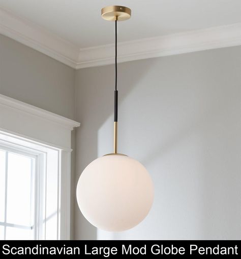 With a European feel, our Scandinavian Large Mod Globe Pendant comes complete with adjustable features and stylish appeal. It’s mid-century style will integrate well into your swanky kitchen without a snag. Black Globe Pendant Light, Scandinavian Light Fixtures, Modern Kitchen Pendants, Modern Kitchen Pendant Lights, Scandinavian Chandelier, Mens Bathroom, Scandinavian Light, Black Globe, Round Pendant Light