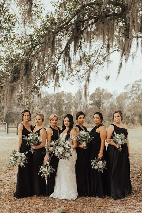 Black bridesmaids dresses are an absolute favorite of ours, especially when they are paired with garden style bouquets. Photographer: Moonlight Photo Co. | Venue: Barn at Cottonwood Ranch Country Wedding Black Bridesmaid Dresses, Bridesmaid Bouquet With Black Dress, Black Summer Bridesmaid Dresses, Black Bridesmaid Dresses Summer, Black Bridesmaid Dress Summer, Balck Dress, Black Bridesmaids Dresses, Ranch Style Weddings, Minimalist Wedding Reception