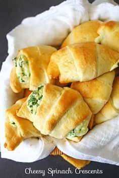 Cheesy Spinach Crescents - Light & fluffy crescent rolls loaded with melted cheese & spinach are easy & delicious! on kleinworthco.com #warmtraditions #ad Cheesy Spinach, Crescent Recipes, Graduation Party Foods, Crescent Roll Recipes, Spinach Recipes, Spinach And Cheese, Thanksgiving Side Dishes, Pesto Pasta, Crescent Rolls