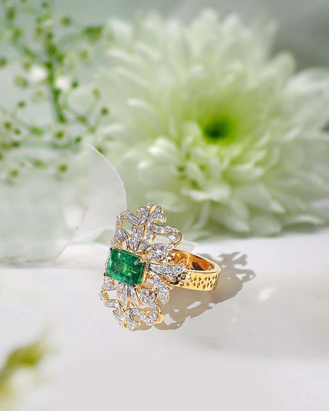 This eye catching diamond and Emerald cocktail ring offers elegant vintage design, rich colour and brilliant sparkle. 💍 Designed and crafted by Faya, this handmade piece of stunning jewelry can also be matched with a bracelet in similar design. The centre is a 2.14 ct Zambian Emerald surrounded by sustainable sparkling diamonds. The band of the ring has a distinct jali design hand carved in 18k gold. Maahru ring is truly a work of Art. Make a statement in our new and exclusive ring collecti... Emerald Cocktail Ring, Emerald Cocktail, Jali Design, Zambian Emerald, Stunning Jewellery, Sparkle Diamonds, Cocktail Ring, Cocktail Rings, Vintage Design