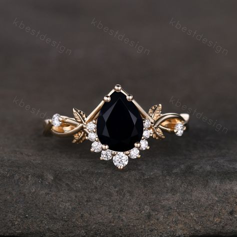 Vintage pear black onyx engagement ring yellow gold twig leaf wedding ring nature branch ring art deco moissanite bridal promise ring. Unique pear shaped ring, wedding ring, promise ring, anniversary gift. Main Stone: 6x8mm pear shaped black onyx Side stone: Moissanite  *I accept custom making order.Please contact me if you need this service. This ring is marked S925/G10K/G14K I accept custom making order.Please contact me if you need this service. For all the jewelries,there is a 14 days money Black Teardrop Engagement Ring, Halloween Wedding Rings, Vintage Gold Wedding Ring, Black And Gold Engagement Ring, Obsidian Engagement Ring, Black And Gold Wedding Ring, Witchy Engagement Ring, Black Stone Engagement Ring, Black Engagement Rings