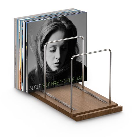 PRICES MAY VARY. 【Stylish Vinyl Record Holder】Made of a complete piece of solid walnut base, with three stainless steel profiles inserted, it can match any type of living room decor, built-in a Now-Playing position in the front of the holder to store and show your “now spinning” record. 【Sturdy Structure】All parts of this vinyl storage rack are made from thick and strong materials, well made and protected, with four slip-resistant silicone pads on the bottom of the walnut base to prevent the rac How To Organize Vinyl Records, Vinyl Record Organization Ideas, Vynil Display, Record Holder Ideas, Record Display Ideas, Vinyl Stand, Vinyl Record Storage Box, Vinyl Holder, Record Organizer