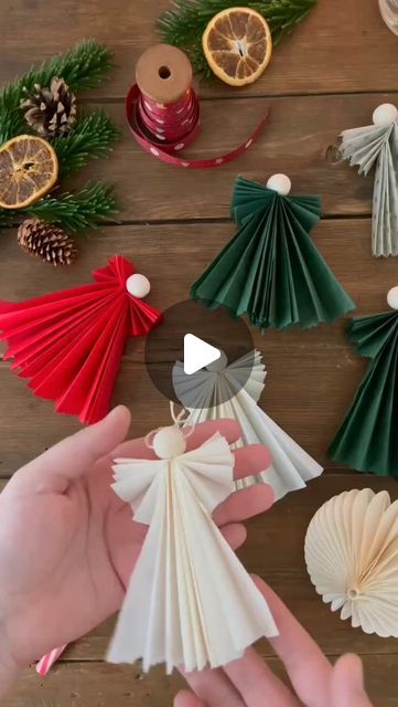 Itsy Bitsy Artsy I Art & Craft I Creative DIY on Instagram: "Make Paper Angels for Christmas decor 😇 ✨ with colorful papers. It's an easy and fun crafting idea. Perfect for kids DIY origami project. 
.
.
.
.
📌 Follow me for more:
➡️ @itsy_bitsy_23
➡️ @itsy_bitsy_23
➡️ @itsy_bitsy_23
.
.
.
.
#PaperCraft #paperdiy #OrigamiFun #KidsCrafts #CraftingWithKids #CreativeKids #origami #handmadedecor #paperangel #chrismasdecor #CraftyKids #CraftTutorial #kindergartenactivities #PaperArt #origamiangel #CraftyIdeas #CraftInspiration #HandmadeJoy #CreativeMinds #CraftyFun #ArtForKids#paperdiy #origamilove #DIYProjects #KidsCrafts #papercrafting #handmade #creativeideas #parentchildhandicraft #parentchildhandmade" How To Make Christmas Angels Craft Ideas, Easy Christmas Angels To Make, Christmas Angel Paper Crafts, Christmas Handmade Decorations Ideas, Christmas Decor Ideas For Children, Christmas Handicrafts For Kids, Angels Diy Crafts, Angel Christmas Craft, Angel Paper Craft