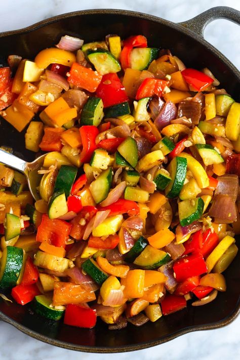 Easy sautéed vegetables recipe! We love this dish with onion, zucchini, bell pepper, and garlic, but you can substitute or add your favorite vegetables. These sautéed veggies are […] Zucchini Mixed Vegetables, Cast Iron Skillet Vegetables, Sauteed Zucchini And Peppers, Balsamic Veggies Sauteed, Assorted Vegetable Recipes, Cooking Fresh Vegetables, Bell Pepper Zucchini Onion, Veggie Melody Recipe, Peppers And Zucchini Recipes