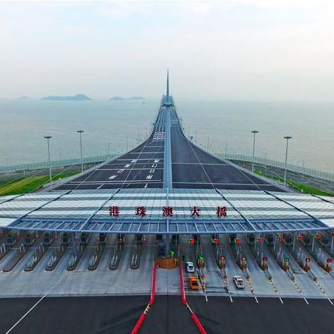 Aerial photo taken on Oct. 24, 2018 shows the toll gate of the Hong Kong-Zhuhai-Macao Bridge in Zhuhai, south China's Guangdong Province.… Toll Gate, Zhuhai, South China, Aerial Photo, Bay Bridge, Hong Kong, Gate, Bridge, Travel