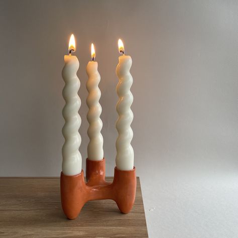 Ceramic Candle Holder For Three Candles.  Completely Handmade.   ✅ covered with glossy varnish ✅ terracotta color ✅ suitable for candles with a diameter of up to 2cm\0.79in 📐Size: 9cm х 9cm\3.5in x 3.5in, height 7cm\2.8in ♻️Material: air dry clay This candleholder is exclusively handmade. Only you will have one. Give it as a gift to yourself or to your close friends. You may also like: https://ukroom.etsy.com/listing/1719725771 Please contact me if you have any questions. Thank you for visiting Ukroom ceramics shop. Air Dry Clay Projects Candle Holders, Terracotta Air Dry Clay, Air Dry Candle Holder, Air Dry Clay Candle Holder, Ceramics Candle Holder, Terracotta Candle Holder, Terracotta Candle, Terracotta Color, Three Candles