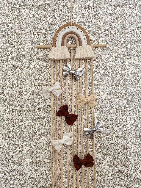 Step up your bow storage game with this rainbow baby bow holder ◦ This macrame wall hanging was made to organize your baby girl's hair bows, hair clips, hair ribbons, headbands & keep your baby boy's bow ties in check ◦ vs. becoming a wadded up mess in a drawer   PLANET-FRIENDLY PACKAGING Sustainably shipped in compostable mailers & snugly protected in eco-friendly, green bubble wrap ◦ 0% plastic, 100% natural ◦ There's no planet B...the small steps add up SPEEDY DELIVERY WITH A PERSONAL TOUCH Y Macrame Hair Clip, Hair Clip Organizer, Baby Boy Bow Tie, Bow Storage, Rainbow Bow, Macrame Rainbow, Green Bubble, Rainbow Nursery