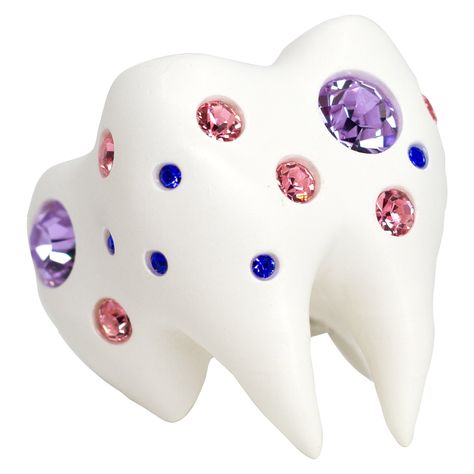 Sugar, spice and everything sparkly. The Sweet Tooth Ring is a lifelike chunky tooth embellished with three different sizes of crystals in violet, pink, and sapphire, each placed individually by hand. This chonky ceramic finished tooth sits on a solid sterling silver band engraved with our signature logo and "you are loved" phrase. Origin story: The Sweet Tooth crawled out of an abandoned candy wrapper found on the street. Toxic trait: Only drinks diet coke. Tooth Ring, Tooth Enamel, Candy Wrapper, Anti Fashion, Candy Jewelry, Origin Story, Online Closet, Fun Jewelry, Magical Jewelry