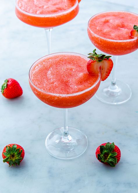 Strawberry Frosé Is The Best Way To Drink Rosé This SummerDelish Margaritas, Summer Punch Recipes, Frozen Sangria, Summer Beverages, Lemonade Slushies, Frozen Drink Recipes, Easy Alcoholic Drinks, Frozen Cocktail Recipes, Batch Cocktails