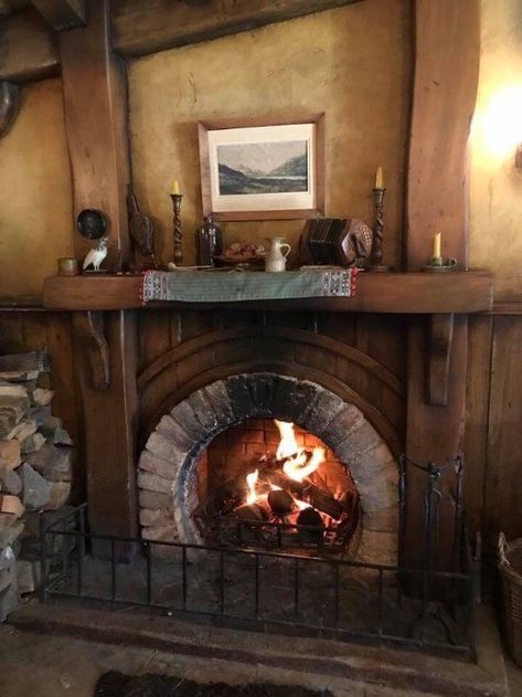 Hobbit House Interior, Black Hearth, Dnd Room, Casa Hobbit, Night Decor, Storybook Homes, Wood Stove Fireplace, Hobbit Hole, Hobbit House