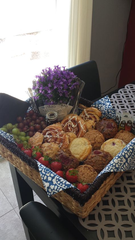 FDM sure knows how to assemble a gift basket!  This one is full of breakfast goodies like muffins, pastries, fruit, tea, and coffee.  Add a colorful floral arrangement for a pop of color! Picnic Gift Basket, Sympathy Gift Ideas, Pastry Basket, Sympathy Basket, Breakfast Gift Basket, Breakfast Basket, Sympathy Gift Baskets, Picnic Gifts, Breakfast Gift