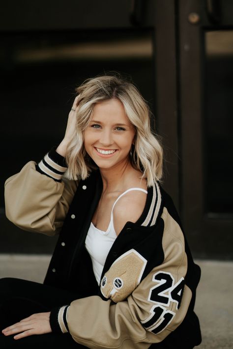 Senior Jacket Photoshoot, Senior Pictures At Night With Lights, Leatherman Jacket Senior Pictures, Poses With Letterman Jacket, Senior Picture With Letterman Jacket, Jersey Senior Pictures Photo Ideas, Letterman Photoshoot, Senior Pics Letterman Jacket, Senior Year Jackets