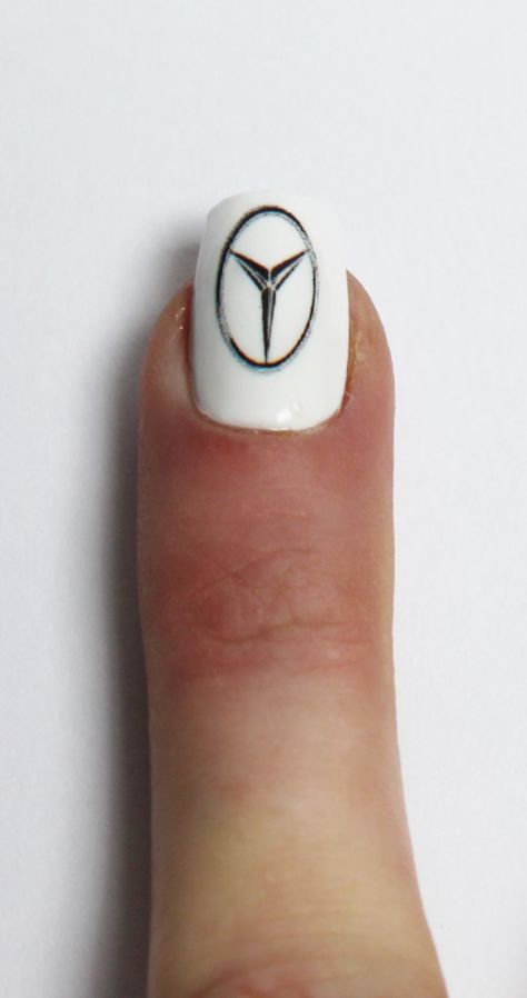 Mercedes badge, get your car logo on a set of nails with us #nails #nailart #car #badge #logo #white Mercedes Benz Nails Art Designs, Mercedes Nails Art Designs, Mercedes Benz Nails, F1 Nail Art, Formula 1 Nail Art, Formula 1 Nails, Mercedes Nails, F1 Nails, F1 Style