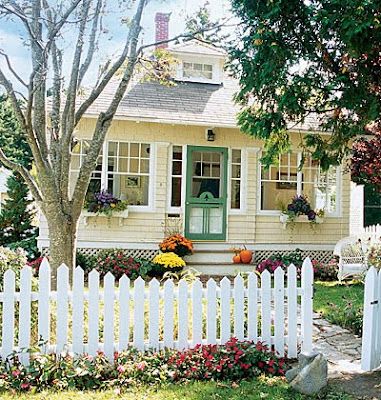 The Cottage Nest: Cottage Dreams Yellow House Exterior, Picket Fencing, Exterior House Colors With Brown Roof, Picket Fences, Farmhouse Architecture, Brown Roof, Yellow Cottage, Pintura Exterior, Cottage Exterior