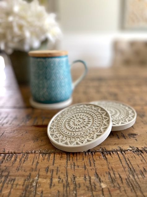 This HANDMADE concrete coaster set is a classic and simple accessory that complements any office, outdoor or indoor space, table, kitchen or living area.  Every piece is custom made-to-order, within our very own studio. We feature industrial, modern, and farmhouse designs which we believe exhibit more character and charm when variations occur. We sometimes make slight purposeful design choices which includes refraining from solid/uniform coloring.   You'll love this set... and it makes the perfe