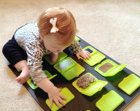 Create a Peek-a-Boo Sensory Board for your toddler to explore could make this a matching sensory activity Baby Zintuiglijk, Baby Wipes Container, Maluchy Montessori, Wipes Container, Sensory Board, Baby Activity, Sensory Boards, Activity Board, Toddler Play