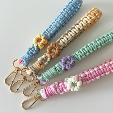 Make your phone pop with our **Handmade Macrame Phone Strap - Pick Your Colours: Choose 3 colours for the flower petal, flower core, and flower vine 🎨 - Choose Your Hardware: Gold or silver ✨ - Easy Attachment: All straps come with a plastic patch to attach to your phone 🔗 - Handmade with Love: Unique, just like you ❤️ (approx. 20cm) - Care Tips: Hand wash 🧼, dry flat 🌞, no wringing 🚫 Note: Case not included. **Customization Instructions  1. **Flower Petal Colour Choose your favourite colour for the petals. 2. **Flower Core Colour Select a colour for the flower's core. 3. **Flower Vine Colour Pick a colour for the vine. 4. **Hardware Choice Decide between gold or silver hardware. Create your one-of-a-kind strap today and stand out! 🌟 Macrame Phone Strap, Macrame Daisy, Flower Core, Diy Wall Art Decor, Petal Flower, Phone Strap, Handmade Macrame, Macrame Tutorial, Hardware Gold