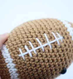 Football Amigurumi - Free Crochet Pattern - StringyDingDing Football Pillow Crochet, Crocheted Football Pattern, Football Amigurumi Free Pattern, Crochet Baseball Bat Free Pattern, Crochet Football Pillow Pattern Free, Crochet Rugby Ball Pattern Free, Football Crochet Pattern, Sports Crochet Patterns, Football Crochet Pattern Free