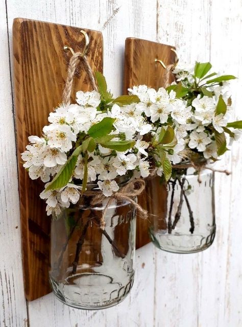 💗Pair of 2 Rustic Recycled Wood pillar wall mounted holders with jars for candles or flowers💗 Handmade unique rustic home decor. Made from old/ recycled wood- aged near beautiful Baltic sea, recycled from barn doors. Wall mounted jar candle holders are made by artist and  look great as in different style family houses, as in holiday houses, as in weddings. Perfect, cozy rustic barn/woodland wedding decoration Every single jar candle/ flowers holder is unique in it`s natural beauty as wood itself contains natural aged features    picture is just as guidance, each candle holder can differ slightly,but its always best quality made for You. Can make wooden boards in custom sizes!!!(message me to get a quote) ♡ PRODUCT OVERVIEW ♡ Set contains 2 wall mounted wooden boards. Size of wooden board Jars For Candles, Rustic Fireplace Decor, Wooden Candle Holders Rustic, Jar Candle Holders, Rustic Wood Candle Holders, Woodland Wedding Decorations, Mason Jar Candle Holders, Rustic Wood Wall Decor, Woodland Wall