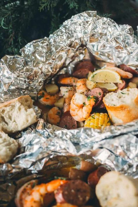 Shrimp Boil Foil Packets 🦐🌽 - Girl Carnivore Shrimp Boil Foil Packets, Seafood Shack, Shrimp Boil Foil, Cajun Butter, Shrimp Boil, Foil Packets, Spicy Sausage, Cajun Seasoning, Hot Sauce