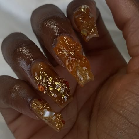 ✨🍊 Book your next nail appt today! @bratcrylix - Not able to book? Order your next custom made press on set @bratcrylix with the order form in my bio! Check "press ons" highlight for more info🤗 - Gel-x nails , burnt orange nails , nail art , flower nails , gold nails , chrome nails , nail design #atlnails #atlnailtech #atlnailsalon #atlantanails #atlantanailsalon #atlantanailtech #cummingganails #cummingganailsalon #cummingnails #cummingnailtech #alpharettanails #alpharettanailtech Oshun Nails, Gold Y2k Nails, Orange Nails Acrylic Design, Gold Orange Nails, Orange And Gold Nail Designs, Burnt Orange Nails Acrylic, Gold Nails Chrome, Gold Flower Nails, Gel Flower Nails