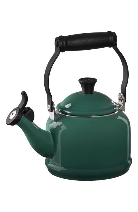 Durable carbon-steel composition with a glossy enameled finish ensures this classic tea kettle will stand the test of time. The flip lid features a single-tone whistle to let you know when water has reached a rolling boil, while a heat-resistant, ergonomic handle ensures safe and easy pouring. Compatible with gas, electric, ceramic, halogen and induction heat sources, this kettle is designed with a generous base to ensure maximum contact and a quick boil. 9 1/2" x 6 3/4" x 10" 2.4 lb. Holds 1.25 Le Creuset Kettle, Coffee Oatmeal, Stovetop Kettle, Enameled Cast Iron Cookware, Induction Heating, French Press Coffee, Fine Craft, Stoneware Mugs, Heating Element