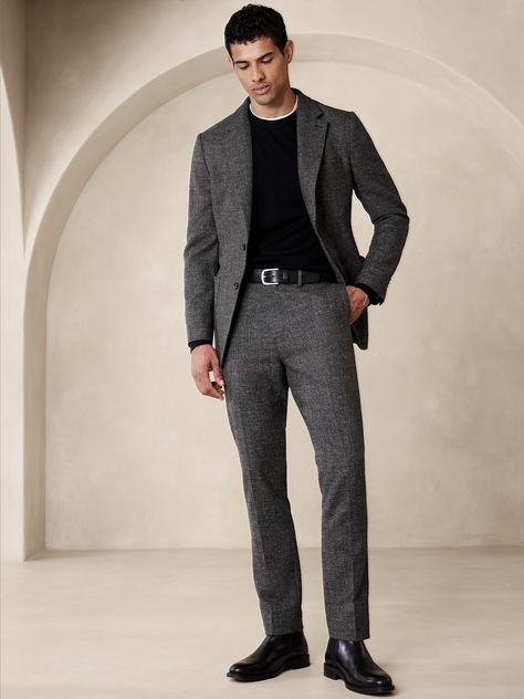 This pant is meticulously crafted from a blend of cotton and wool, woven for us in Italy to produce a texture that balances perfectly between tweed and twill.  Tailored Slim Fit: A modern slim fit, with a tapered leg and distinctive break at the hem.  Fabric from Italy's Marzotto mill.  Zip fly with button closure.  Belt loops.  Front and back pockets.  Coin pocket at wearer's right.  Lined to the knee.  Tailored Slim fit: A modern Slim fit, with a tapered leg and distinctive break at the hem. Suits For Tall Men, Men Formal Outfit, Fall Suit, Blazer Outfits Men, Winter Suits, Classy Suits, Tweed Suit, Mens Work Pants, Black Pants Men