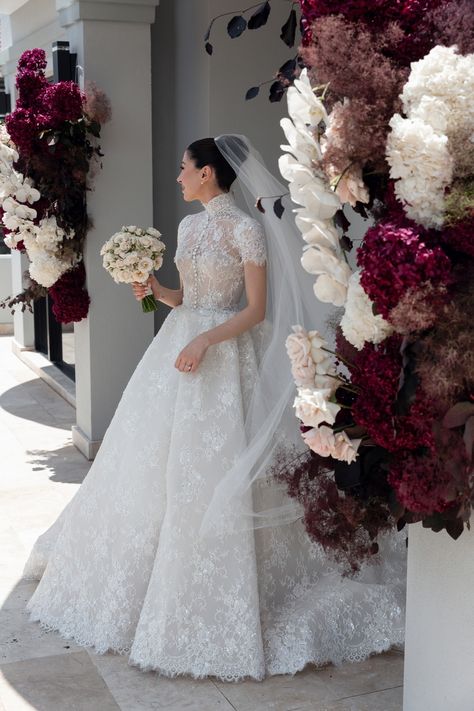 Helena radiates in custom couture STEVEN KHALIL. Captured beautifully by @georgejohnphotography. ⁣⁣ #stevenkhalil #stevenkhalilbride | Instagram Bouquet For Bride, Wedding Dress 2024, Steven Khalil, Rose Floral Arrangements, Party Table Centerpieces, Bride's Bouquet, High Neck Wedding Dress, Pretty Wedding Dresses, Fancy Wedding Dresses