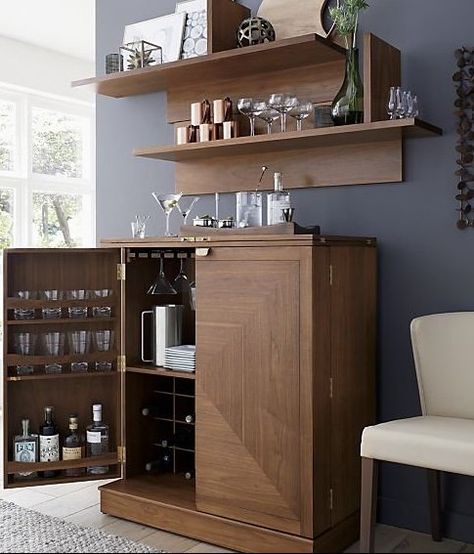 Parquet panels piece together gorgeous grain and color in this walnut bar cabinet that's ready to roll about the room for instant entertaining. With a flip and pull of the clean-styled brass hardware, the bar is open for business. Finished on all four sides, Maxine can float in a room. Its wood top folds out to an expanded work surface inset with black laminate. #homebar #barcabinetideas #bardecor Loft Wall, Crate Shelves, Muebles Living, Bar Storage, Home Bar Designs, Home Bar Furniture, Mobile Bar, Home Bar Decor, Contemporary House Design