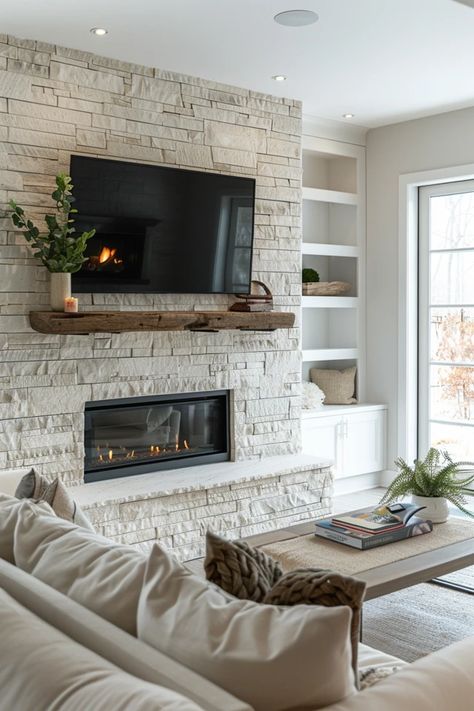 Discover the best techniques for securely mounting your TV to a stone fireplace with our step-by-step guide. Elevate your space safely and stylishly. Rock Wall With Tv And Fireplace, Family Room With Stone Fireplace, Tv Mount Above Fireplace, Stone Fireplace And Built Ins, Stone Wall Fireplace With Tv, Tv On Stone Fireplace, Tiles Fireplace Surround, Tv Mounted On The Wall In Living Room, Gas Fireplace Living Room