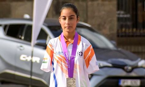 In an awe-inspiring display of indomitable spirit, Sheetal Devi, a 16-year-old armless archer, achieved an astounding victory at the Asian Para Games, claiming the Women's individual title. Her extraordinary performance in the finals against Singapore's Alim Nur, where she emerged triumphant with a score of 144-142, is a testament to her unwavering dedication and unmatched skill. This victory marked her second gold medal in this edition of the multi-sport event. Sheetal Devi, Image via Th... Sheetal Devi, Multi-sport Event, Resume Format, Gold Medal, Sport Event, Awe Inspiring, First World, Victorious, Entertainment