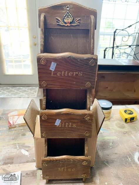 One of my favorite ways to save money is repurposing thrift store items to use as part of my home décor. Old wood mail sorters are an easy DIY project and can be found for cheap! Like this one, I repurposed a few months back. You can see it HERE.I found this one for $1.50. It was marked at $2.99 but it was the color of the day, so I scored it for 50% off. Even though it was outdated and had a few dings, it could still be saved! And what’s going on with those gold accents? Eeekk! For… Wood Basket Decor Ideas, Thrift Repurpose, Vintage Repurposed Items, Mail Sorters, Thrift Store Diy Projects, Mail Sorter, Thrift Store Diy, Refinished Furniture, Hand Painted Wallpaper