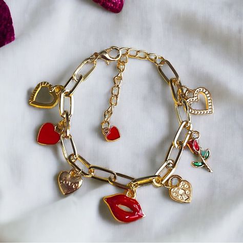 Wow Your Loved One With This Unique, Love And Kisses Charm Bracelet! Made From Gold Plated Alloy, This Paper Clip Chain Is Gorgeous And Shiny With Red And Gold Charms. Lead Free And Nickel Free. Tarnish Resistant With Proper Care. Perfect For A Valentine’s Day Gift! Charm Necklace Diy, Love And Kisses, Contemporary Bracelets, Dope Jewelry Accessories, Diy Charm Bracelet, Gold Charms, Custom Charms, Dope Jewelry, Jewelry Lookbook