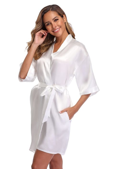 PRICES MAY VARY. Soft Satin Imported Tie closure Machine Wash Classic Oblique V Neck Kimono Robe, Solid color USEFUL DETAIL: Two on seam pockets, inner string tie and Removable sash Lightweight Robe; 3/4-Length Sleeves; Mid-Thigh Length A perfect addition to your lingerie wardrobe. Also a great as a getting ready robe for bride, bridesmaids  Women's Classic Pure Color Kimono Robe   Fabric: 100% polyester. Luxurious Looking, Soft & Smooth Feeling   Classic Oblique V Neck & Solid color   USEFUL DE Bridesmaid Bathrobe, Short Kimono Robe, Bridesmaid Satin, Personalized Robe, Bridesmaid Getting Ready, Kimono Robes, Bridal Party Robes, Satin Kimono, Short Kimono