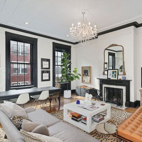 White walls, black trim, wood floor White Walls Black Trim, Bedroom White Walls, Black Baseboards, Black Trim Interior, Install Crown Molding, Black Window Trims, Off White Walls, Black And White Living Room, Bedroom White