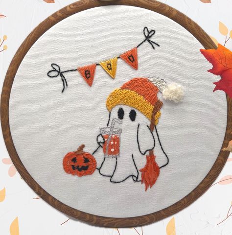 Easy Halloween Ghost Embroidery kit | Cozy Autumn wall art Decor | Halloween hand embroidery design| Cute Ghost with drink cup | Great for beginners! Add a touch of whimsy to your autumn decor with this adorable handmade ghost embroidery hoop embroidery kit ! This charming piece features a cozy ghost sipping a fall drink, dressed in a knit hat, with a cute pumpkin beside it. Perfect for Halloween, this embroidery hoop art is ideal for anyone who loves spooky season with a touch of cuteness. The Spooky Season Embroidery, Halloween Felt Patterns, Cute Ghost Embroidery, Ghost Embroidery Pattern, Halloween Hand Embroidery, Pumpkin Wall Decor, Embroidery Pumpkin, Spooky Embroidery, Embroidery Fall