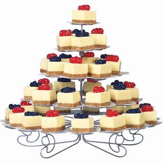 Individual Cheesecakes - I know someone who would love this.  The Groom.  Proud to Plan: Alternatives to a Traditional Wedding Cake Cheesecake Wedding Cake, Wedding Cheesecake, Individual Cheesecakes, Cheesecake Squares, Wedding Cake Pictures, Traditional Wedding Cake, Salty Cake, Magic Cake, Dessert Stand