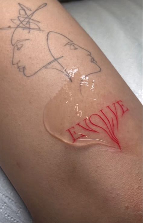 the word « evolve » in red tattoo anchor Dripping Word Tattoo, Evolve Tattoo Words, Red Art Tattoo, Cool Red Tattoos, Red Sticker Tattoo, Red Tattoo Faded, Red Swirl Tattoo, Dripping Tattoo Ideas, Melting Words Tattoo