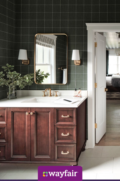 We can't stop obsessing over this modern bathroom. Want to bring the look home for yourself? Shop hundreds of wooden vanities, gold hardware, and green wall tiles to make this look yours. Brown Bathroom, Kitchen And Bath Design, غرفة ملاب�س, Upstairs Bathrooms, Urban Oasis, Main Bathroom, Bathroom Inspo, Green Bathroom, Vintage Bathroom