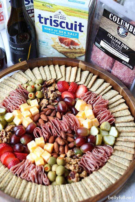 Charcuterie Board with salami, Triscuit crackers, cheese and fruit Super Bowl Meat And Cheese Tray, Charcuterie Board Ideas With Sandwiches, Simple Cute Charcuterie Board, Chip And Dip Charcuterie Board Ideas, Cracker And Cheese Charcuterie Board, Simple Round Charcuterie Board, Charcuterie Boards On A Budget, Easy Chacutery Boards Diy, Charcuterie Board Set Up Ideas