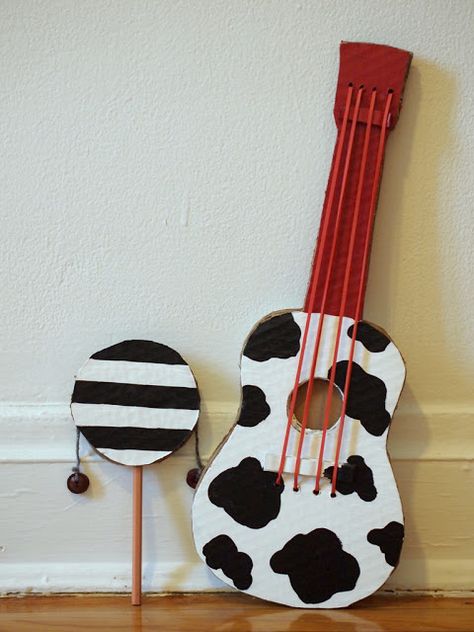 Pink Stripey Socks: Make a cardboard guitar Cardboard Guitar, Instrument Craft, Homemade Instruments, Diy Instruments, Handmade Charlotte, Diy Musical Instruments, Super Party, Diy Cardboard, Arts And Crafts For Kids