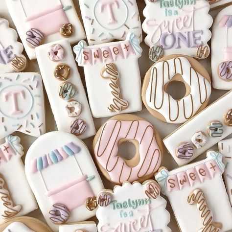 BasicWhiteBatchCookieCo on Instagram: "Donut grow up. A theme too sweet for words . . #donutgrowup #toosweet #donutcookies #donutbirthday #donuts #donut #decoratedcookies #royalicingcookies #royalicingart #customcookies #birthdaygirl #sprinkles #sugarcookiesofinstagram" Sweet One Donut Cookies, Sweet One Sugar Cookies, Sweet One Birthday Cookies, Donut Cookies Decorated, Sweet One Cookies, Specialty Cookies, Donut Cookies, First Birthday Cookies, Cookies Theme