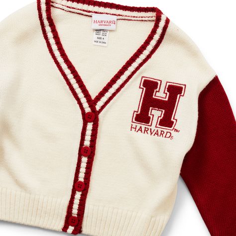 Freshen up her outfits with some varsity style thanks to pieces like the Harvard University Cardigan. This college style throw over features the iconic Harvard burgundy and white to a knit construction, and is made complete with striped detailing and a buttoned front. School Cardigan, Harvard College, Varsity Cardigan, University Girl, Her Outfits, Harvard Law, Girls Jumpers, Varsity Style, Girls Cardigan